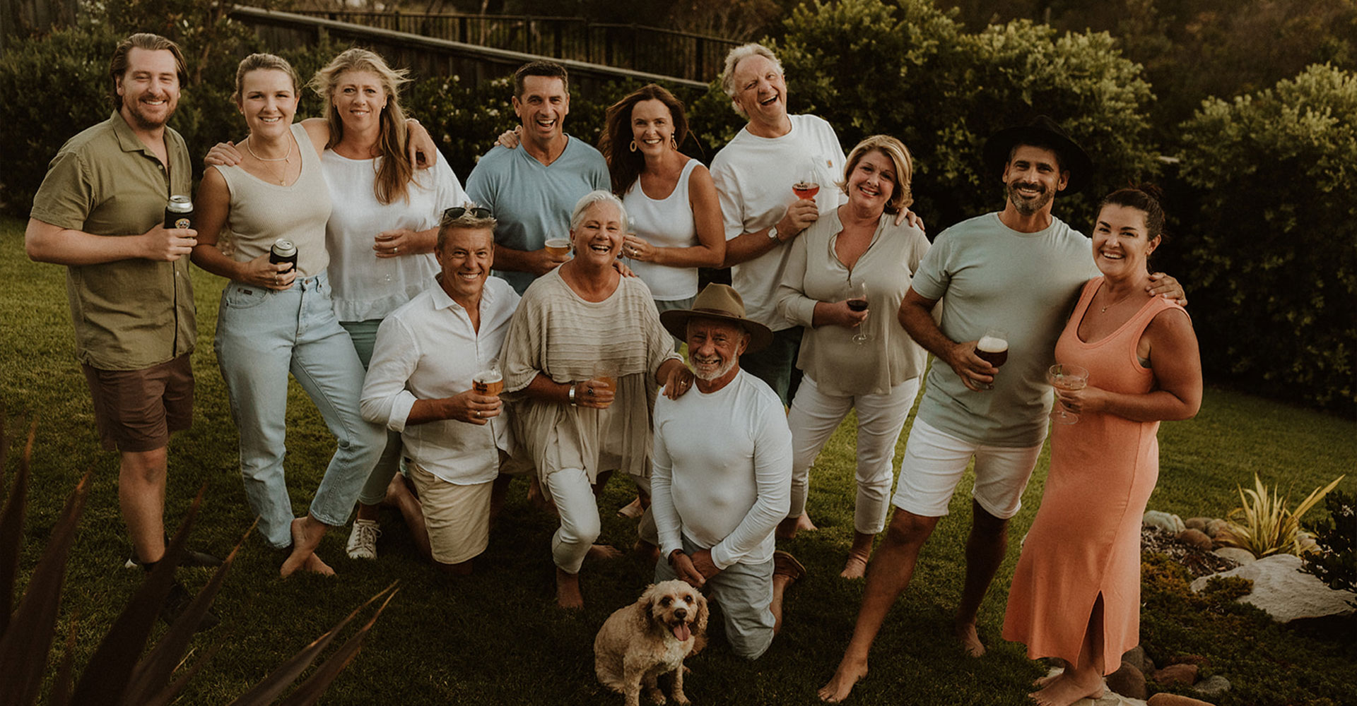 Group of Brewery Company founders having a beer to celebrate the launch in their yard on the Central Coast